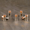 close up of Sig Sauer V-crown bullets loaded in 9mm ammunition cartridges